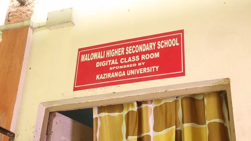 Sign reading Malowali Higher Secondary School Digital Class Room, sponsored by Kaziranga University