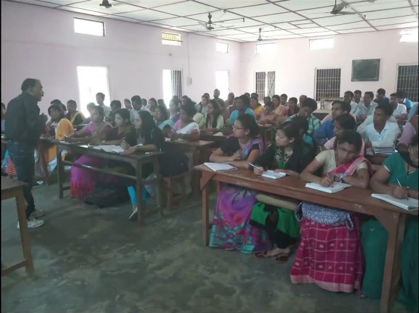 A full classroom of students during a gathering