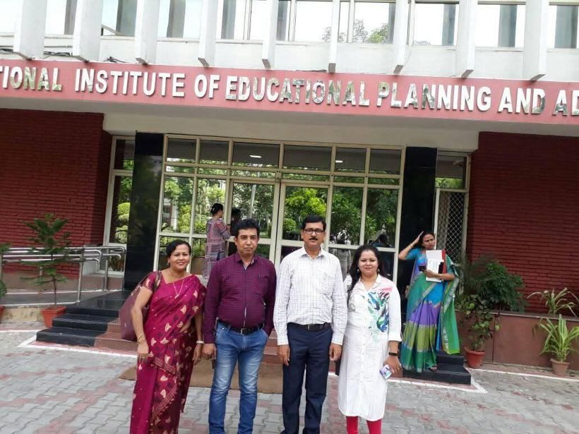 Shyamalima Borah, left, with colleagues outside the NIEPA building in New Delhi
